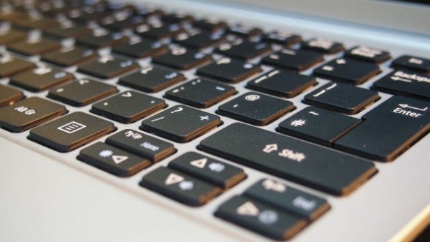 Close-up of laptop keyboard indicating design quality.