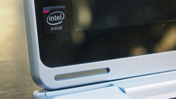Close-up of a laptop corner with Intel sticker and speaker grille.