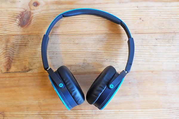 AKG Y50 headphones on wooden surface
