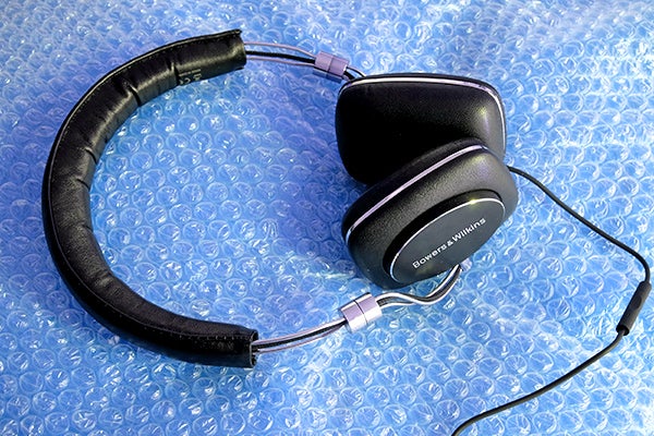 Bowers & Wilkins P5 Series 2 headphones on blue bubble wrap.