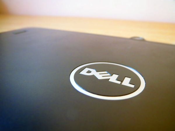 Close-up of Dell logo on Latitude 13 7000 Series laptop lid.