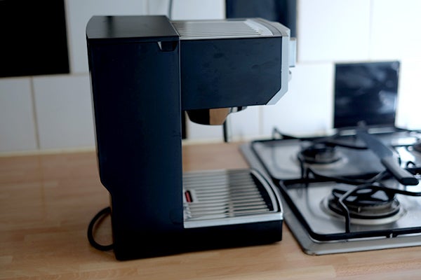 Krups XP5620 espresso machine on a kitchen counter.