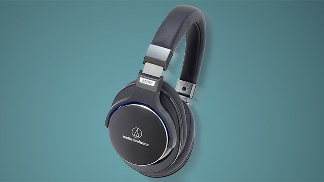 Audio-Technica ATH-MSR7 headphones on a teal background.