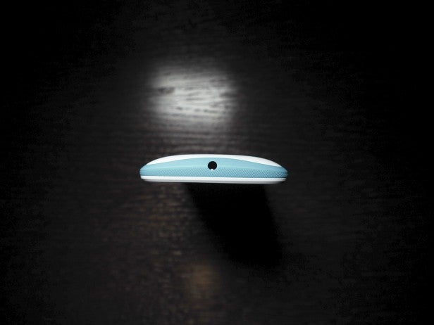 Motorola Moto E 2nd Gen smartphone spotlighted on dark surface.