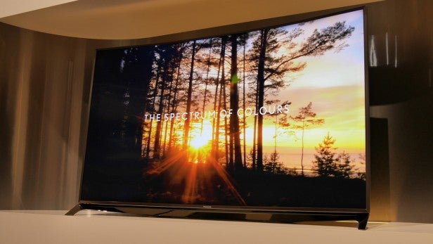 Panasonic TX-65CR850 TV displaying vibrant color spectrum.Panasonic TX-65CR850 displaying vibrant sunset scene.