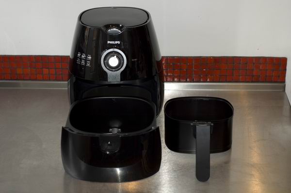 Philips Viva Airfryer HD9220 with open drawer on kitchen counter.