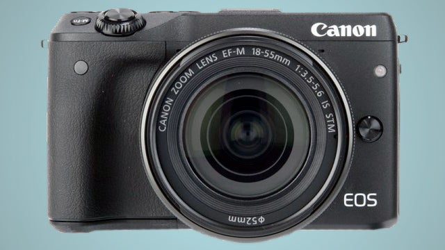 Canon EOS M3 mirrorless camera with 18-55mm lens.