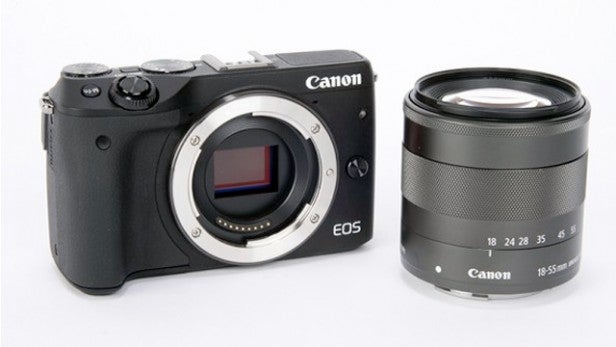 Canon EOS M3 camera body with 18-55mm lens detached.