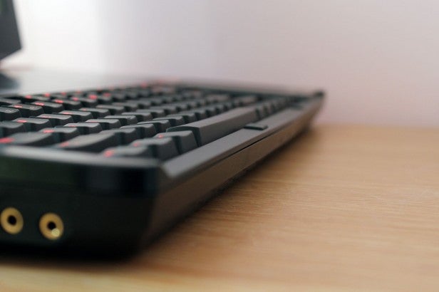 Gaming keyboard on desk highlighting keys and build quality.