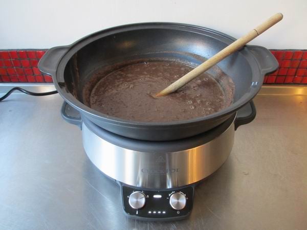 Crock-Pot 6L Digital Sauté Slow Cooker in use with food.