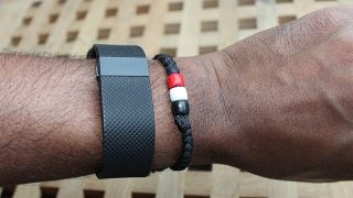 Fitbit Charge HR wearable fitness tracker on wrist.