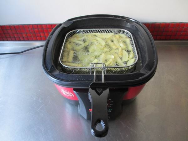 JML GoChef cooker frying potatoes on kitchen counter.