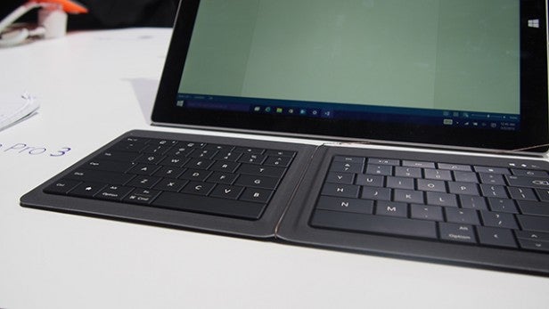 Microsoft foldable Bluetooth keyboard with a tablet.