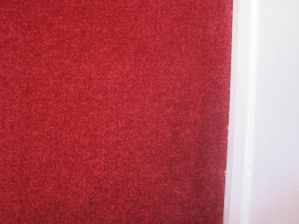 Clean red carpet after using Miele Compact C2 vacuum.