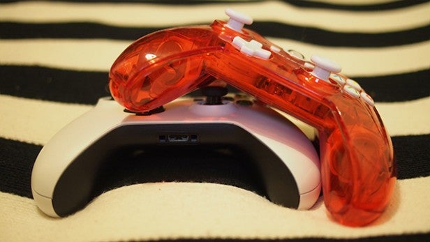 Red Rock Candy wired controller for Xbox One on striped background