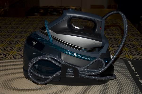 Rowenta Silence Steam iron on table with packaging.