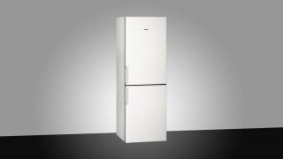 White Siemens KG30NVW20G fridge freezer on a gradient background