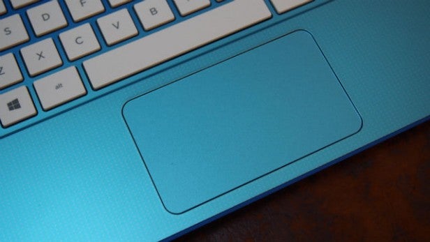 Close-up of laptop keyboard and touchpad.