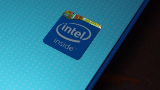 Intel logo on a blue laptop surface.