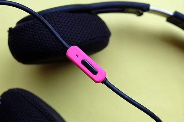 Close-up of SMS Audio headphones' inline control button.