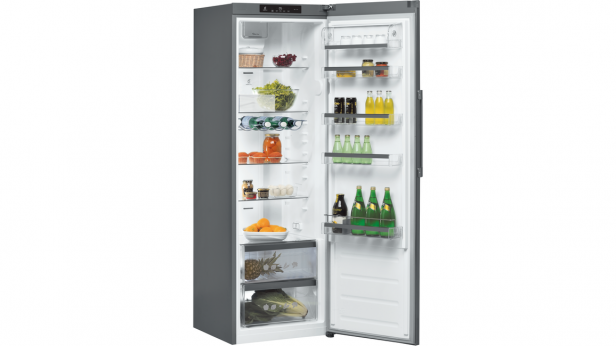 Whirlpool WME36562 X refrigerator fully stocked with food items.