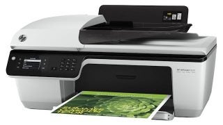 HP Officejet 2620 printer with a color printout.
