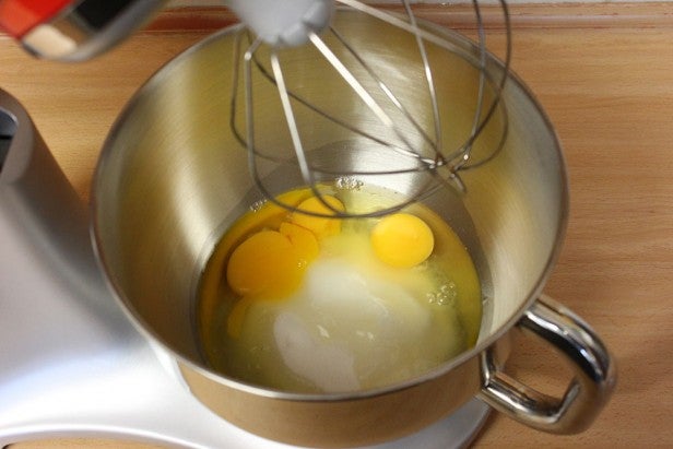 Smeg mixer with eggs and sugar ready to whisk.