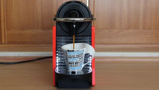 Magimix Nespresso Pixie coffee machine in use.