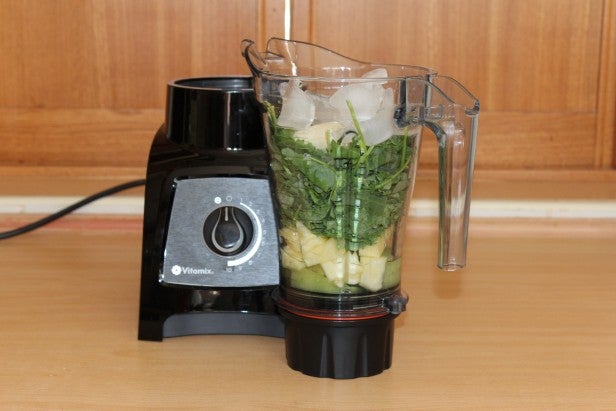 Vitamix S30 blender with fruits and vegetables ready to blend.