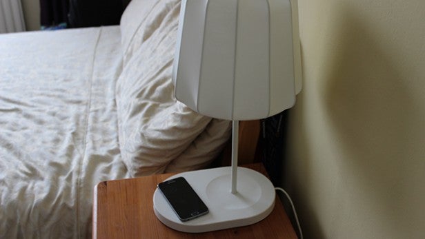 Ikea Varv lamp with built-in wireless charging and smartphone.