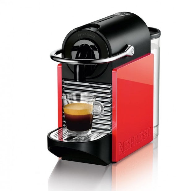 Magimix Nespresso Pixie machine brewing espresso into a cup.