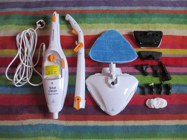 Morphy Richards steam cleaner with accessories displayed.