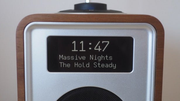 Ruark Audio R1 Mk3 radio displaying time and song information.