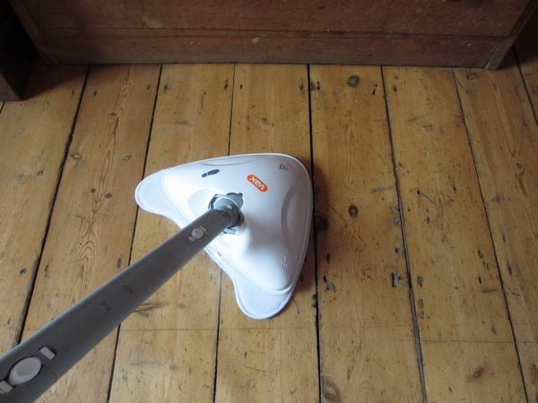 Vax S6S Home Pro Steam Cleaner on a wooden floor