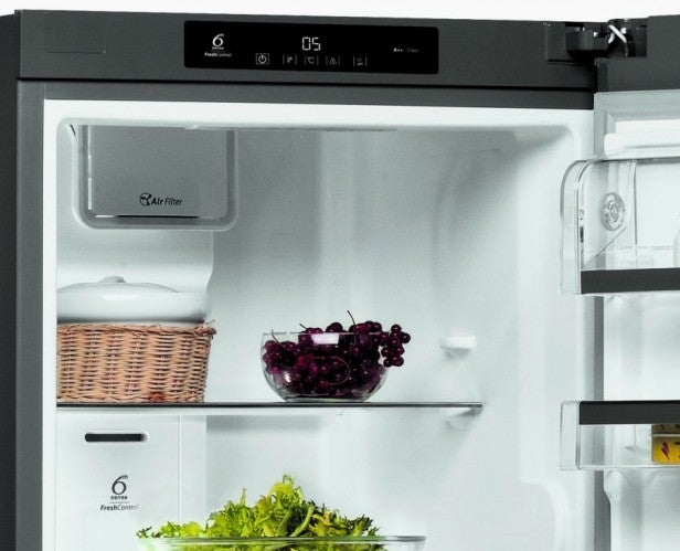 Interior view of Whirlpool WME36562 X refrigerator with food items