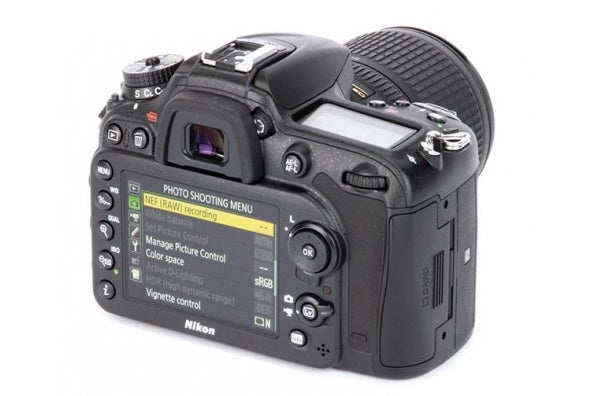 Nikon D7200 DSLR camera with menu screen displayed.