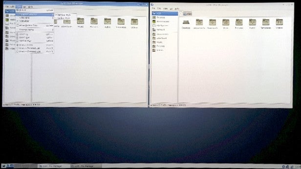 Debian operating system file manager interface on a monitor.