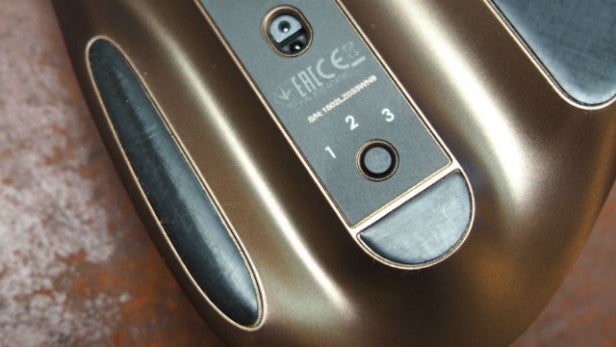 Close-up of Logitech MX Master mouse side buttons and scroll wheel.