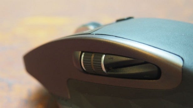 Close-up of Logitech MX Master mouse side buttons.