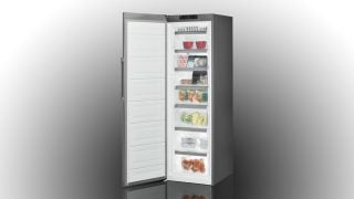 Whirlpool WVE26552 NFX fridge with open door showing contents.
