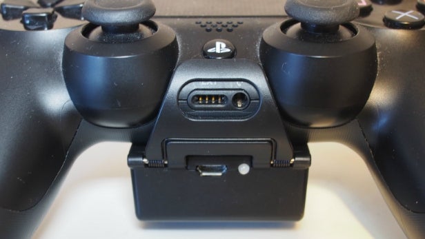 Venom rechargeable battery pack attached to PS4 controller.