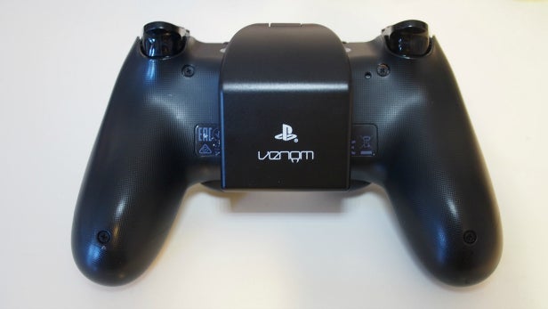 Venom rechargeable battery pack attached to PS4 controller.