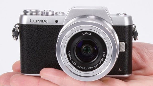 Close-up of Panasonic Lumix GF7 camera held in hand