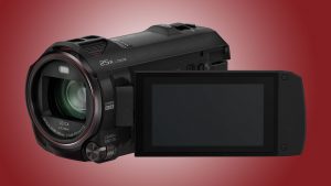 Panasonic HC-VX870 camcorder with flip-out screen.