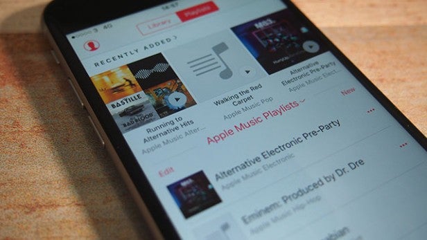 Smartphone screen displaying Apple Music playlists.