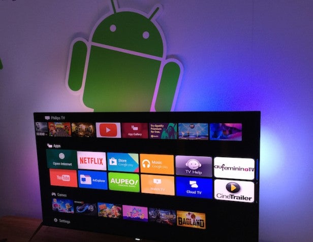 Philips 50PFT6550Television displaying colorful smart TV interface with Android logo in background.