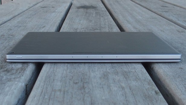 Pixel CGoogle Pixel C tablet closed on wooden surface.
