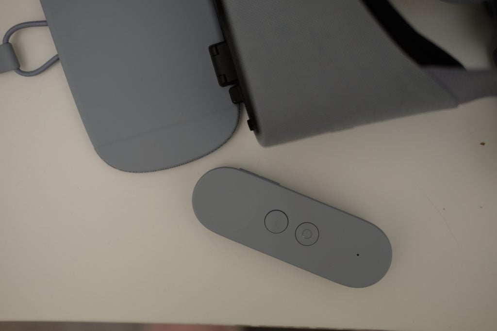 Google Daydream View headset and controller on a table.