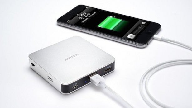 Aiptek MobileCinema i70Portable battery charging a smartphone displaying battery level.