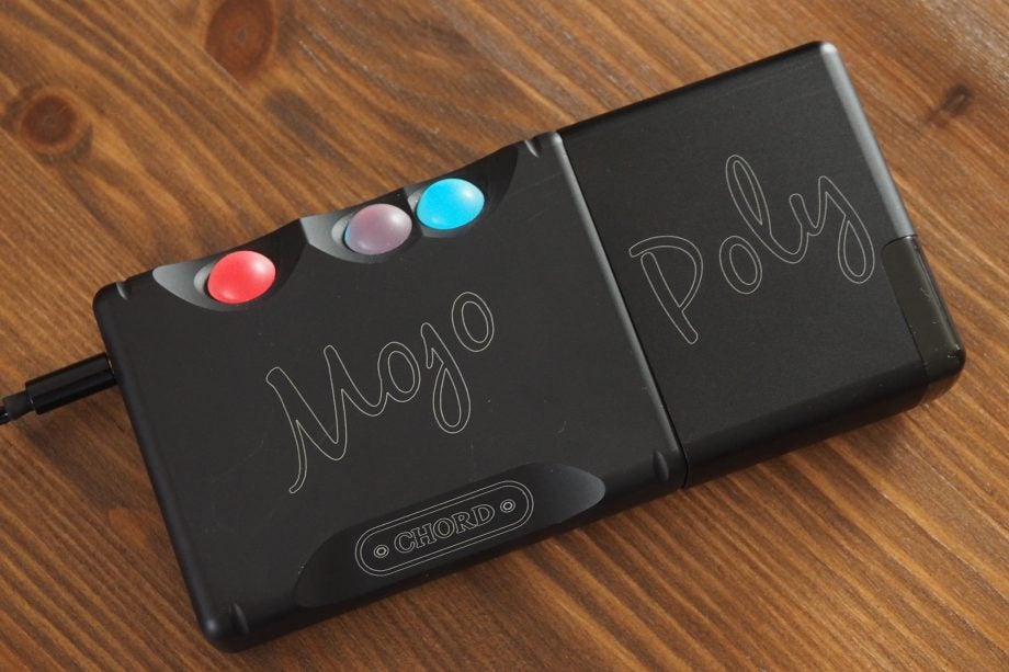 Chord Mojo and Poly portable music players connected on wood.
